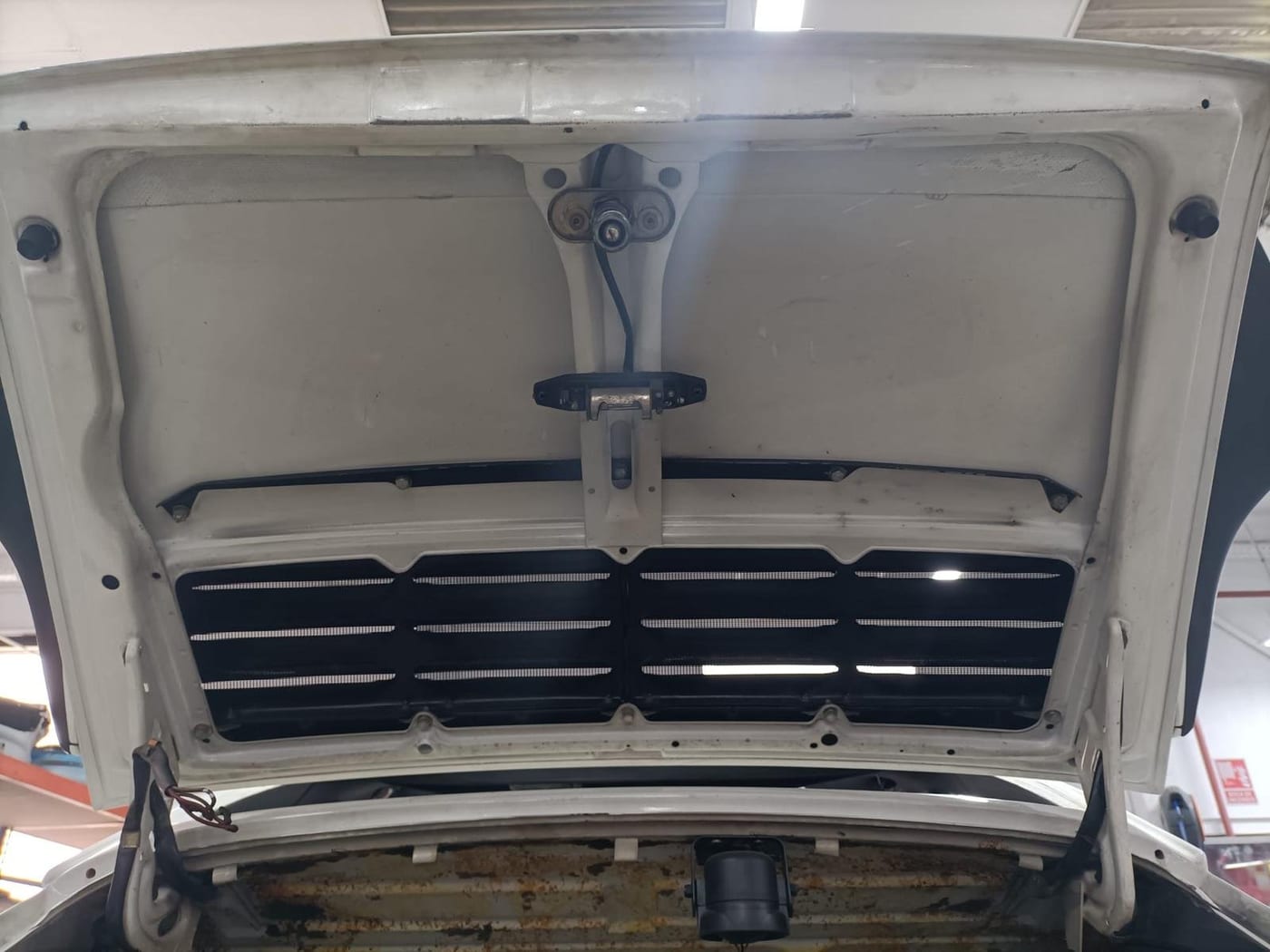 Inside of the G-series 911's engine lid, freshly painted